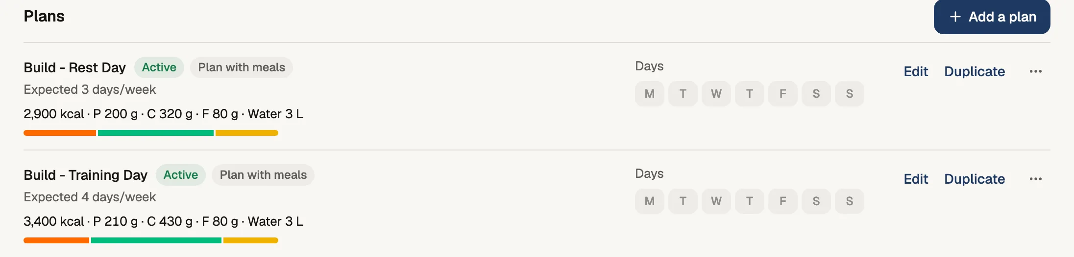 Tom's nutrition plans in the coach app: a rest day and a training day plan with calories and macros